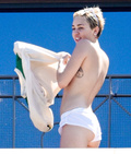 Miley Cyrus topless in Sydney (10/2014)