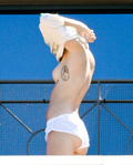 Miley Cyrus topless in Sydney (10/2014)