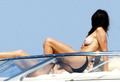 Cindy Crawford - sunbathing topless in Sardinia(8/2008)